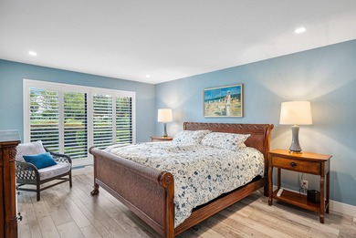 Welcome to this inviting 1st‑floor home showcasing serene on Quail Ridge Golf Course and Country Club in Florida - for sale on GolfHomes.com, golf home, golf lot