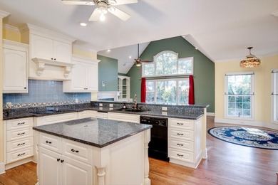 Located in an exclusive gated community this beautiful custom on The Reserve Club At Woodside Plantation in South Carolina - for sale on GolfHomes.com, golf home, golf lot