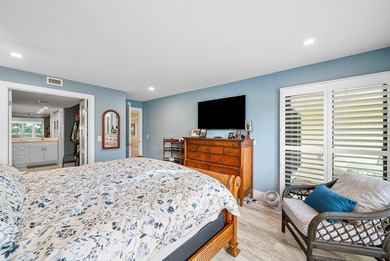 Welcome to this inviting 1st‑floor home showcasing serene on Quail Ridge Golf Course and Country Club in Florida - for sale on GolfHomes.com, golf home, golf lot