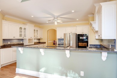 Located in an exclusive gated community this beautiful custom on The Reserve Club At Woodside Plantation in South Carolina - for sale on GolfHomes.com, golf home, golf lot