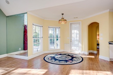 Located in an exclusive gated community this beautiful custom on The Reserve Club At Woodside Plantation in South Carolina - for sale on GolfHomes.com, golf home, golf lot