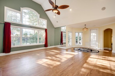 Located in an exclusive gated community this beautiful custom on The Reserve Club At Woodside Plantation in South Carolina - for sale on GolfHomes.com, golf home, golf lot