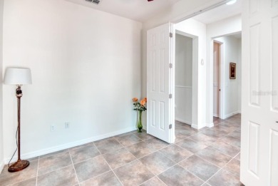 Move-in ready Avellino model, featuring a Courtyard entry to on Stonegate Golf Club in Florida - for sale on GolfHomes.com, golf home, golf lot