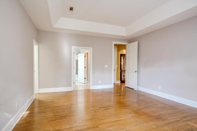 Located in an exclusive gated community this beautiful custom on The Reserve Club At Woodside Plantation in South Carolina - for sale on GolfHomes.com, golf home, golf lot