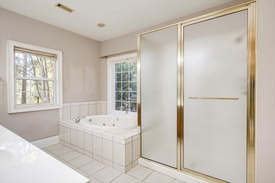 Located in an exclusive gated community this beautiful custom on The Reserve Club At Woodside Plantation in South Carolina - for sale on GolfHomes.com, golf home, golf lot