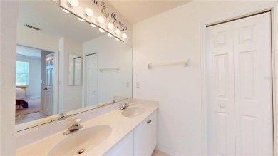 Enjoy breathtaking WATER AND CANAL VIEWS from the comfort of on Saint Andrews South Golf Club in Florida - for sale on GolfHomes.com, golf home, golf lot