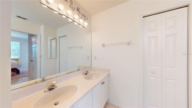 Enjoy breathtaking WATER AND CANAL VIEWS from the comfort of on Saint Andrews South Golf Club in Florida - for sale on GolfHomes.com, golf home, golf lot