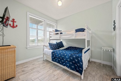 Welcome to 733 Ridge Point Drive, a beautifully maintained home on The Currituck Golf Club in North Carolina - for sale on GolfHomes.com, golf home, golf lot