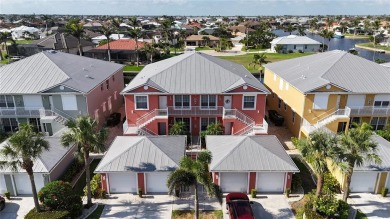 Enjoy breathtaking WATER AND CANAL VIEWS from the comfort of on Saint Andrews South Golf Club in Florida - for sale on GolfHomes.com, golf home, golf lot