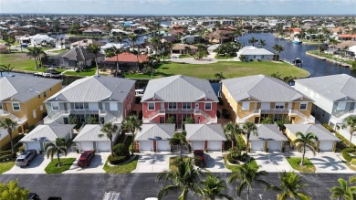 Enjoy breathtaking WATER AND CANAL VIEWS from the comfort of on Saint Andrews South Golf Club in Florida - for sale on GolfHomes.com, golf home, golf lot
