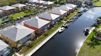 Enjoy breathtaking WATER AND CANAL VIEWS from the comfort of on Saint Andrews South Golf Club in Florida - for sale on GolfHomes.com, golf home, golf lot