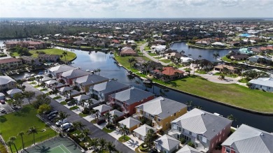 Enjoy breathtaking WATER AND CANAL VIEWS from the comfort of on Saint Andrews South Golf Club in Florida - for sale on GolfHomes.com, golf home, golf lot