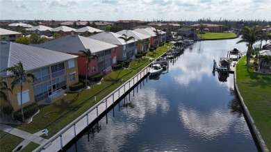 Enjoy breathtaking WATER AND CANAL VIEWS from the comfort of on Saint Andrews South Golf Club in Florida - for sale on GolfHomes.com, golf home, golf lot