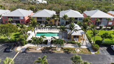 Enjoy breathtaking WATER AND CANAL VIEWS from the comfort of on Saint Andrews South Golf Club in Florida - for sale on GolfHomes.com, golf home, golf lot