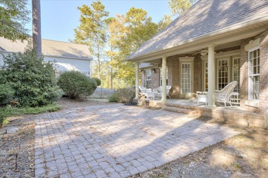 Located in an exclusive gated community this beautiful custom on The Reserve Club At Woodside Plantation in South Carolina - for sale on GolfHomes.com, golf home, golf lot