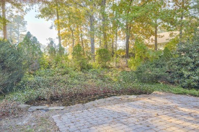 Located in an exclusive gated community this beautiful custom on The Reserve Club At Woodside Plantation in South Carolina - for sale on GolfHomes.com, golf home, golf lot