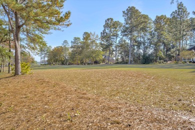 Located in an exclusive gated community this beautiful custom on The Reserve Club At Woodside Plantation in South Carolina - for sale on GolfHomes.com, golf home, golf lot