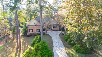 Located in an exclusive gated community this beautiful custom on The Reserve Club At Woodside Plantation in South Carolina - for sale on GolfHomes.com, golf home, golf lot