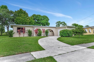 Beautiful 3 Bedroom, 2 Bathroom, 1 Car Garage Home in the on Club Med Sandpiper in Florida - for sale on GolfHomes.com, golf home, golf lot