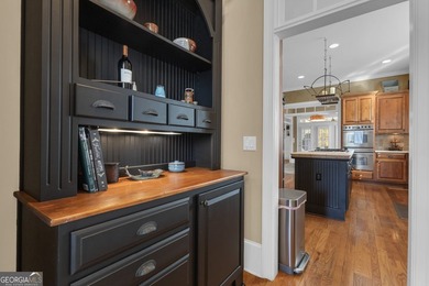 Perched at the end of a quiet cul-de-sac in sought-after on Whitewater Creek in Georgia - for sale on GolfHomes.com, golf home, golf lot