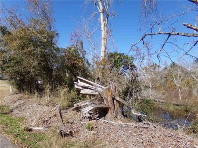 283 foot waterfront lot on Choupique Bayou in Carlyss, Louisiana on Bayou Oaks Country Club in Louisiana - for sale on GolfHomes.com, golf home, golf lot