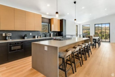 This ultra-modern home overlooks Bear Lake with 5 bedrooms, 4 on Bear Lake Golf Course in Utah - for sale on GolfHomes.com, golf home, golf lot