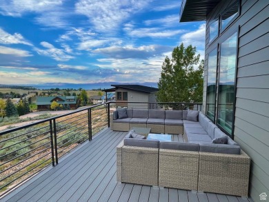 This ultra-modern home overlooks Bear Lake with 5 bedrooms, 4 on Bear Lake Golf Course in Utah - for sale on GolfHomes.com, golf home, golf lot