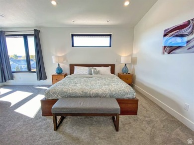 This ultra-modern home overlooks Bear Lake with 5 bedrooms, 4 on Bear Lake Golf Course in Utah - for sale on GolfHomes.com, golf home, golf lot