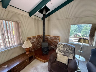 This darling little Lake Almanor Country Club cabin could be the on Lake Almanor Country Club in California - for sale on GolfHomes.com, golf home, golf lot