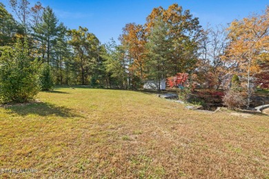 Welcome to your lakeside sanctuary on Lake Tansi's shores, a on Lake Tansi Village Country Club in Tennessee - for sale on GolfHomes.com, golf home, golf lot