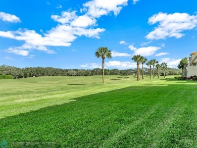 Beautiful golf views!  Desirable 1st floor 2 bedroom, 2 bath on Oak Harbor Country Club in Florida - for sale on GolfHomes.com, golf home, golf lot