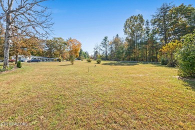 Welcome to your lakeside sanctuary on Lake Tansi's shores, a on Lake Tansi Village Country Club in Tennessee - for sale on GolfHomes.com, golf home, golf lot