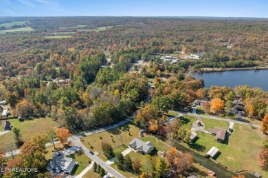 Welcome to your lakeside sanctuary on Lake Tansi's shores, a on Lake Tansi Village Country Club in Tennessee - for sale on GolfHomes.com, golf home, golf lot
