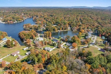Welcome to your lakeside sanctuary on Lake Tansi's shores, a on Lake Tansi Village Country Club in Tennessee - for sale on GolfHomes.com, golf home, golf lot