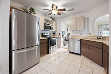 Move-in ready end-unit villa in the highly desirable Crescent on On Top of the World Golf Course in Florida - for sale on GolfHomes.com, golf home, golf lot