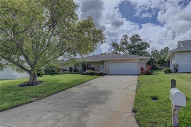 Stunning 4-Bedroom Pool Home on Beacon Woods Golf Course
 on Beacon Woods Golf Club in Florida - for sale on GolfHomes.com, golf home, golf lot