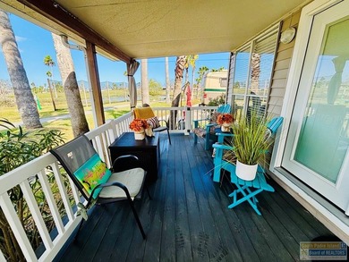 Charming golf-course retreat offering peaceful views and relaxed on Long Island Golf Course in Texas - for sale on GolfHomes.com, golf home, golf lot