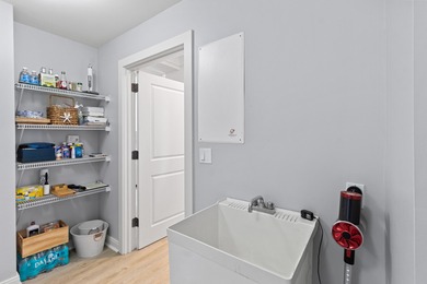 Perched on the top floor with panoramic views of Lake Powell, a on Sharks Tooth Golf Club in Florida - for sale on GolfHomes.com, golf home, golf lot