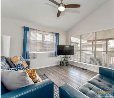 Charming golf-course retreat offering peaceful views and relaxed on Long Island Golf Course in Texas - for sale on GolfHomes.com, golf home, golf lot