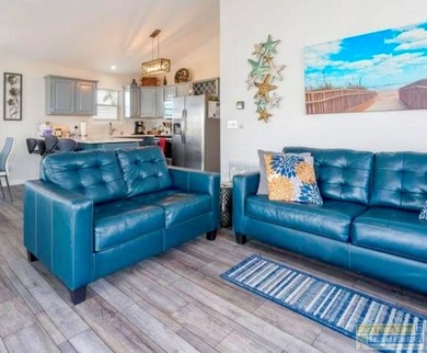 Charming golf-course retreat offering peaceful views and relaxed on Long Island Golf Course in Texas - for sale on GolfHomes.com, golf home, golf lot