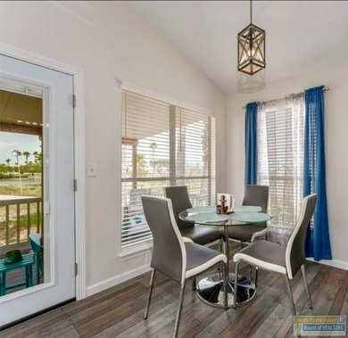 Charming golf-course retreat offering peaceful views and relaxed on Long Island Golf Course in Texas - for sale on GolfHomes.com, golf home, golf lot