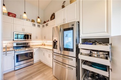 Located in the heart of North Naples, this beautifully on Quail Village Golf Course in Florida - for sale on GolfHomes.com, golf home, golf lot