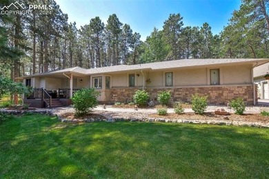 Stunning Stucco and Stone Rancher with Detached Garage/Workshop on Woodmoor Pines Country Club in Colorado - for sale on GolfHomes.com, golf home, golf lot