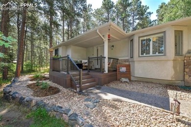 Stunning Stucco and Stone Rancher with Detached Garage/Workshop on Woodmoor Pines Country Club in Colorado - for sale on GolfHomes.com, golf home, golf lot