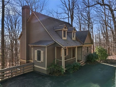 At 2,600-foot elevation, this stunning Craftsman-style retreat on Big Canoe Golf Club - Cherokee in Georgia - for sale on GolfHomes.com, golf home, golf lot