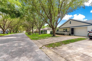 Popular Delphina End Unit Villa located in the Crescent Ridge on On Top of the World Golf Course in Florida - for sale on GolfHomes.com, golf home, golf lot