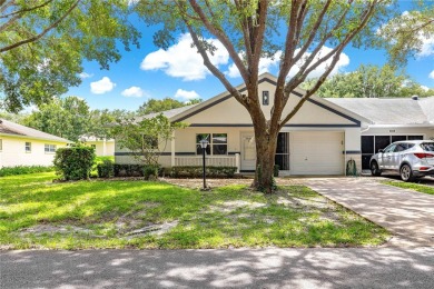Popular Delphina End Unit Villa located in the Crescent Ridge on On Top of the World Golf Course in Florida - for sale on GolfHomes.com, golf home, golf lot