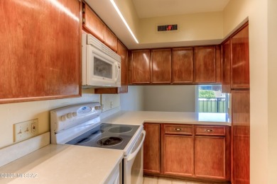 Move in ready, bright and light condominium in gorgeous Eden on Randolph Park Golf Courses in Arizona - for sale on GolfHomes.com, golf home, golf lot