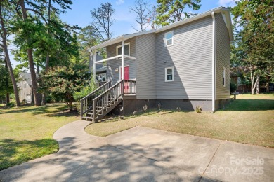 Welcome to this charming 3-bedroom, 2-bath home in Tega on Tega Cay Golf Club in South Carolina - for sale on GolfHomes.com, golf home, golf lot