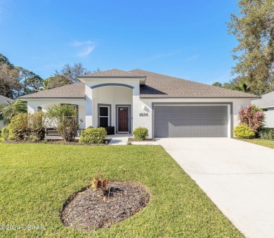 Welcome to your MOVE-IN READY Johnson-built block home, nestled on Turnbull Bay Golf Club in Florida - for sale on GolfHomes.com, golf home, golf lot